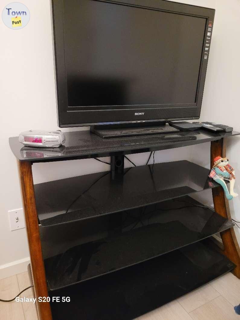 Photo of Tv and tv stand