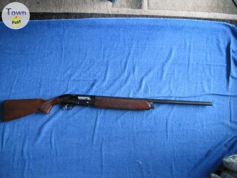 Photo of Beretta 302 Semi auto 20GA 