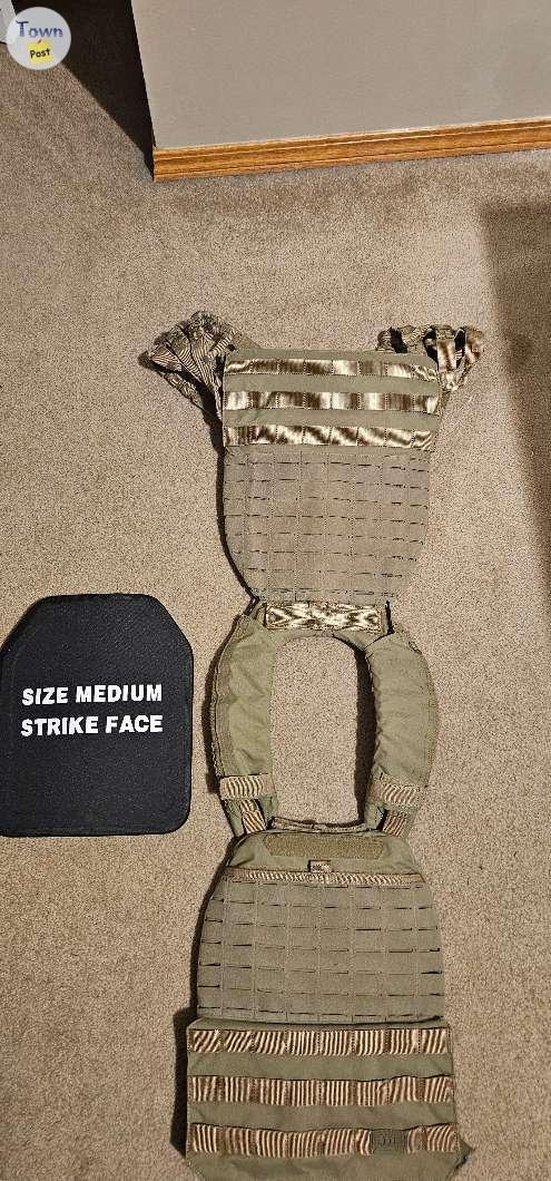 Photo of Rush 5.11 tactec plate carrier, with three plates