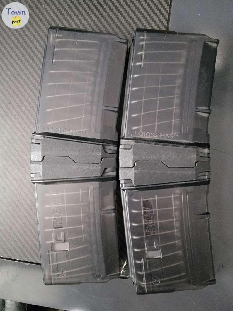 Photo of Two 5.56 cross mags (10+10 per mag) 